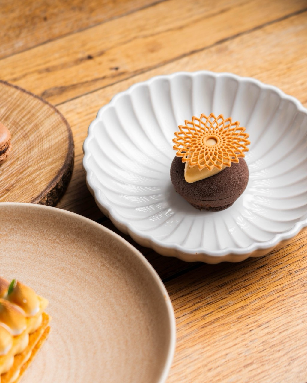 An elegant tasting-menu course plated at The Peacock Inn