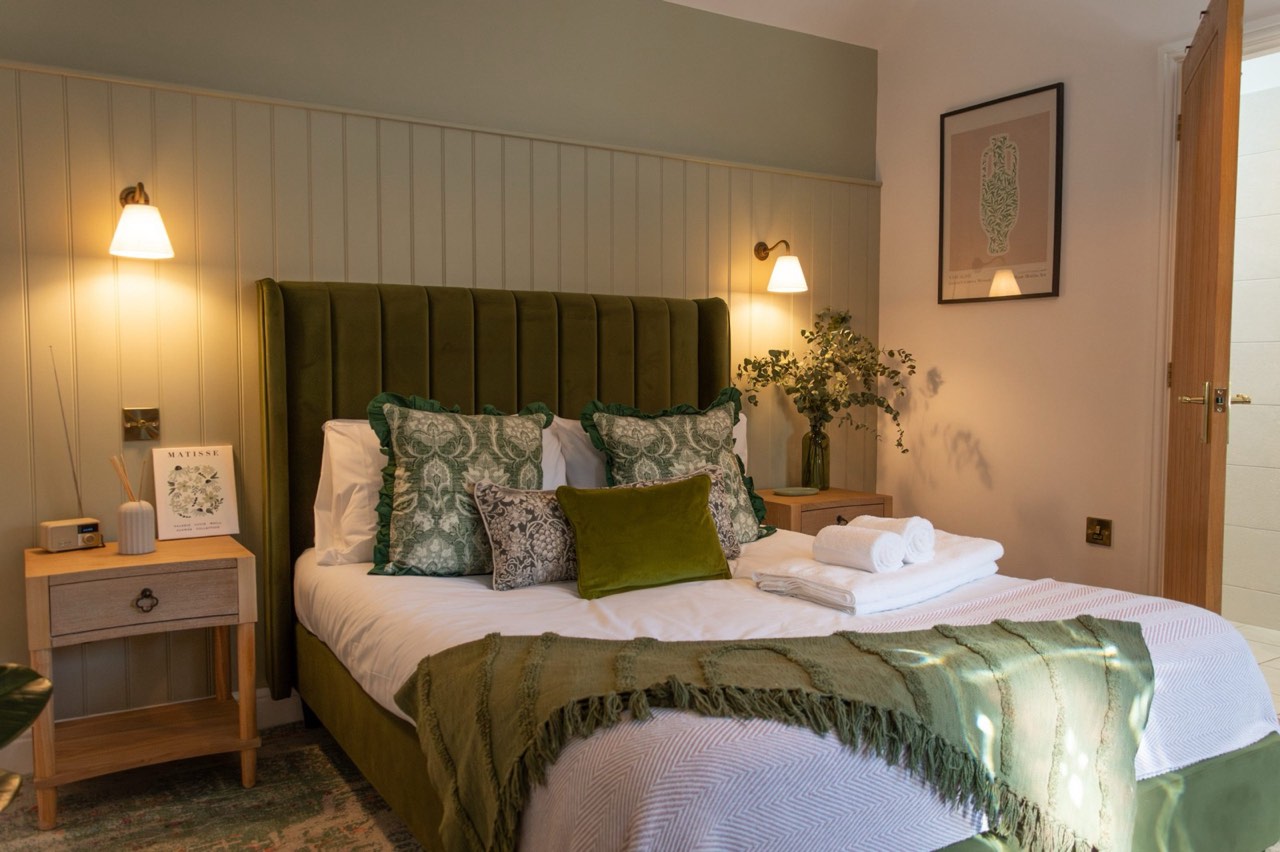 The Stour garden room at The Peacock Inn, facing the pub garden with bright natural light