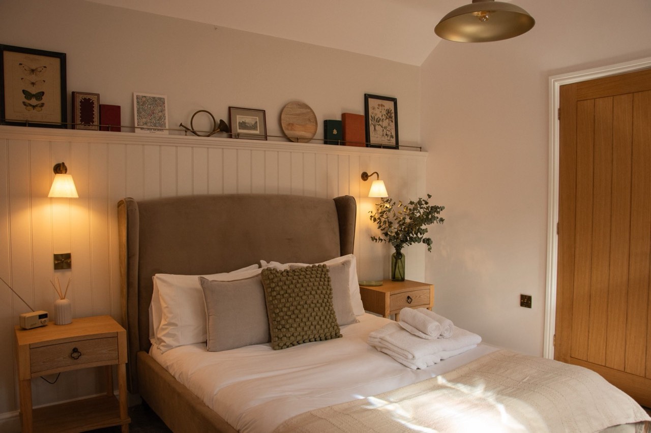 A serene garden room at The Peacock Inn with soft natural light